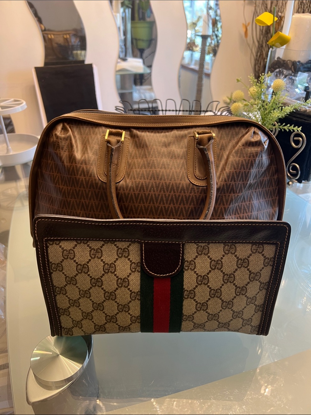 Gucci clutch and a Boston Valentino